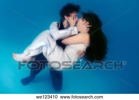 Bride and groom, ring, underwater wedding in pool, Odessa, Ukraine, Eastern Europe View Large Photo Image Stock Image - Bride and groom, ring, underwater wedding in pool, Odessa, Ukraine, Eastern Europe. Fotosearch