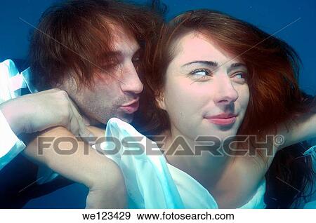 Bride and groom, ring, underwater wedding in pool, Odessa, Ukraine, Eastern Europe View Large Photo Image Stock Photo - Bride and groom, ring, underwater wedding in pool, Odessa, Ukraine, Eastern Europe. Fotosearch