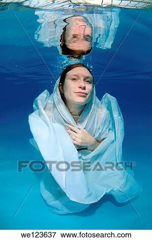 Bride, underwater wedding in a pool View Large Photo Image Stock Photo - Bride, underwater wedding in a pool. Fotosearch