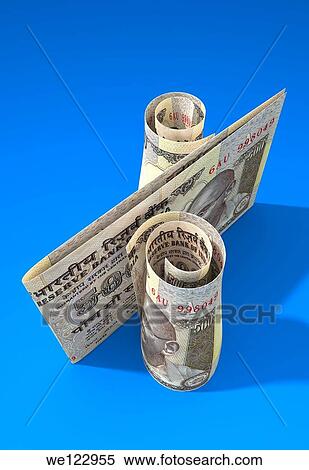 Close-up of Indian currency note over blue background View Large Photo Image Stock Photography - Close-up of Indian currency note over blue background. Fotosearch