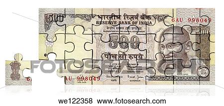 Stock Photo - Five hundred Indian rupee note made of jigsaw piece. Fotosearch