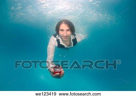 groom, ring, underwater wedding in pool, Odessa, Ukraine, Eastern Europe View Large Photo Image Stock Photo - groom, ring, underwater wedding in pool, Odessa, Ukraine, Eastern Europe. Fotosearch