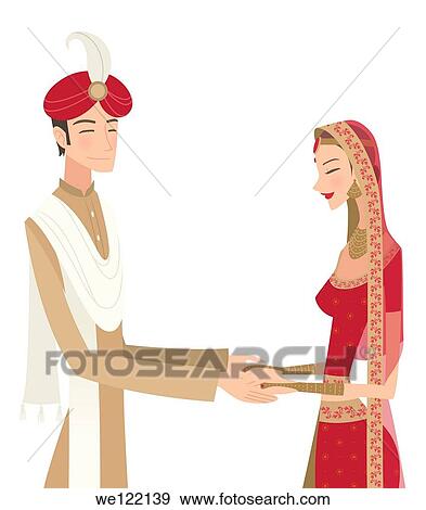 Indian bride and groom in traditional dress at wedding ceremony View Large Photo Image Stock Photo - Indian bride and groom in traditional dress at wedding ceremony. Fotosearch