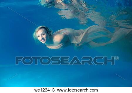 pregnant woman, underwater fashion in a pool View Large Photo Image Stock Image - pregnant woman, underwater fashion in a pool. Fotosearch