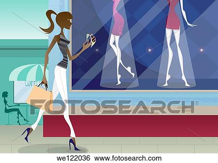 Stock Photograph - Woman carrying shopping bags. Fotosearch