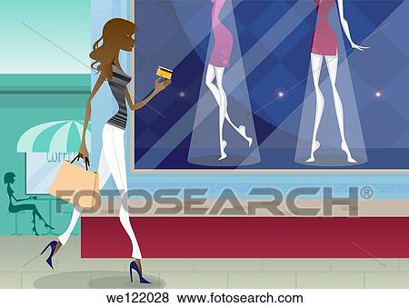Woman carrying shopping bags with a credit card View Large Photo Image Stock Photo - Woman carrying shopping bags with a credit card. Fotosearch