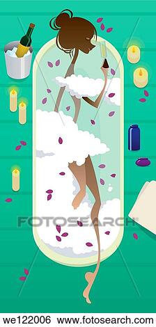Stock Photograph - Woman in a bathtub. Fotosearch