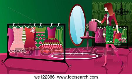 Woman shopping clothes in a clothing store View Large Photo Image Stock Photograph - Woman shopping clothes in a clothing store. Fotosearch