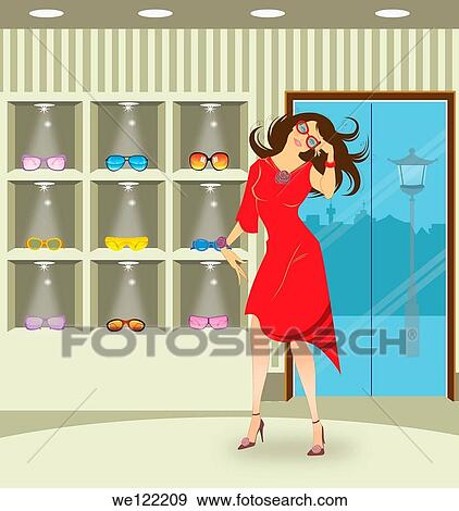 Woman shopping for sunglasses in a store View Large Photo Image Stock Photo - Woman shopping for sunglasses in a store. Fotosearch