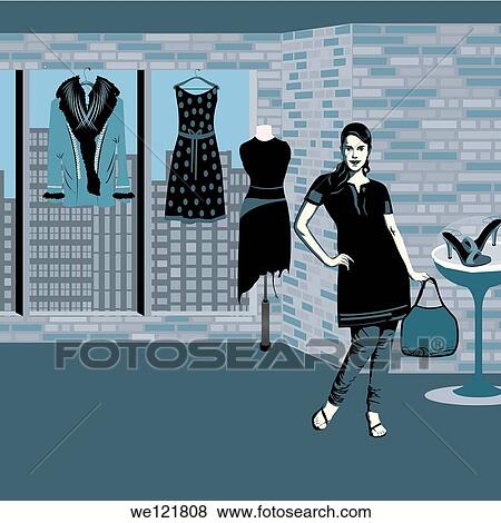 Woman standing in a boutique View Large Photo Image Stock Photo - Woman standing in a boutique. Fotosearch