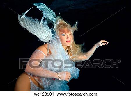 Woman, underwater model presenting fashion in pool View Large Photo Image Stock Image - Woman, underwater model presenting fashion in pool. Fotosearch