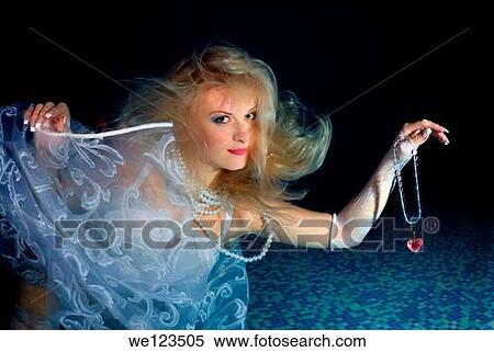 Woman, underwater model presenting fashion in pool View Large Photo Image Stock Photography - Woman, underwater model presenting fashion in pool. Fotosearch