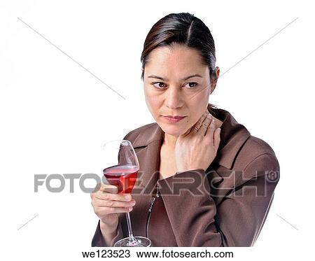Women having a glass of red wine She is looking a little sad White background in studio shot Women is wearing a wedding ring View Large Photo Image Stock Image - Women having a glass of red wine She is looking a little sad White background in studio shot Women is wearing a wedding ring. Fotosearch