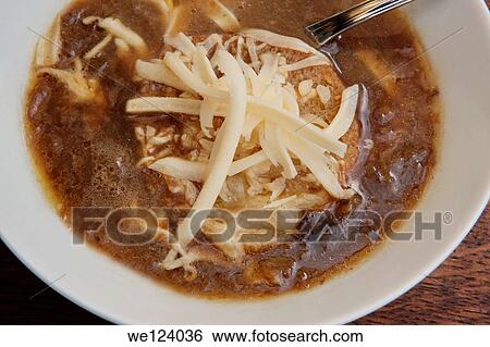 A plate of onion soup with toast and grated cheese. View Large Photo Image Stock Photograph - A plate of onion soup with toast and grated cheese.. Fotosearch