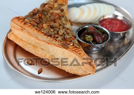 Borek (Also Burek) a Turkish pastry filled with cheese or potato or mushroom. View Large Photo Image Stock Photograph - Borek (Also Burek) a Turkish pastry filled with cheese or potato or mushroom.. Fotosearch