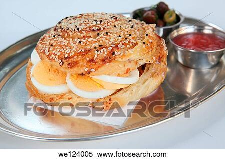 Borek (Also Burek) a Turkish pastry filled with cheese or potato or mushroom with hard boiled egg. View Large Photo Image Stock Photography - Borek (Also Burek) a Turkish pastry filled with cheese or potato or mushroom with hard boiled egg.. Fotosearch