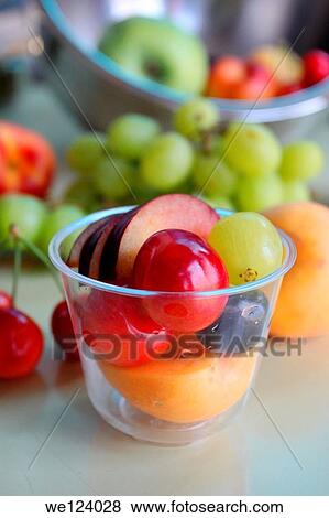 Freshly cut fruit salad with apple, grapes, peaches and cherries. View Large Photo Image Stock Photo - Freshly cut fruit salad with apple, grapes, peaches and cherries.. Fotosearch