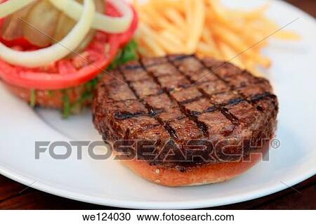 Hamburger with french fries and salad on white background. View Large Photo Image Stock Image - Hamburger with french fries and salad on white background.. Fotosearch