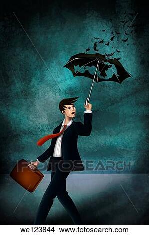 Picture - Illustrative image of young businessman with worn out umbrella in storm representing inadequate insurance.. Fotosearch