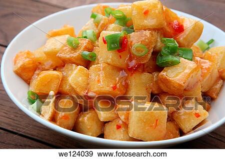 Stock Photo - Potato cubes in a bowl.. Fotosearch