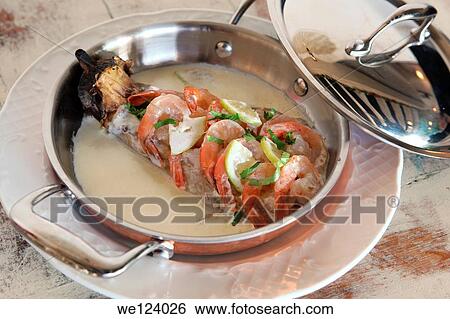 Whole baked aubergine with tahini sauce and tomatoes. View Large Photo Image Stock Photograph - Whole baked aubergine with tahini sauce and tomatoes.. Fotosearch