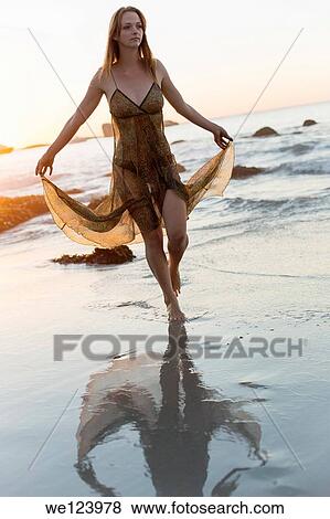Stock Photo - Young Woman On Beach.. Fotosearch