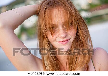 Stock Photograph - Young Woman On Beach.. Fotosearch