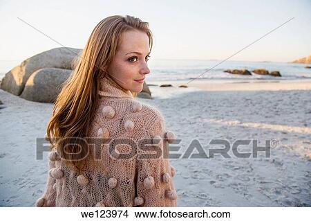 Young Woman Sat On Beach. View Large Photo Image Picture - Young Woman Sat On Beach.. Fotosearch