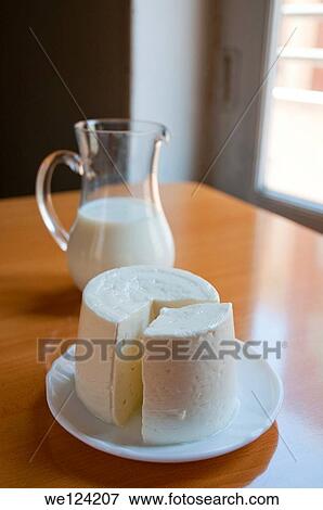 Cottage cheese and jug of milk. View Large Photo Image Stock Photo - Cottage cheese and jug of milk.. Fotosearch