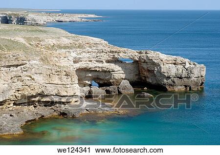 Crocodile Rock, peninsula Tarhankut, Tarhan Qut, Crimea, Ukraine, Eastern Europe. View Large Photo Image Stock Image - Crocodile Rock, peninsula Tarhankut, Tarhan Qut, Crimea, Ukraine, Eastern Europe.. Fotosearch