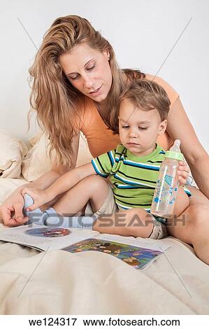 Stock Photo - Mother and her young son.. Fotosearch