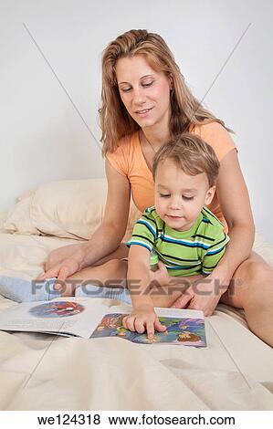 Mother and her young son. View Large Photo Image Stock Photo - Mother and her young son.. Fotosearch