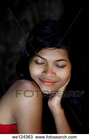 Portrait of a Beautiful Cambodian girl closing her eyes. View Large Photo Image Stock Image - Portrait of a Beautiful Cambodian girl closing her eyes.. Fotosearch