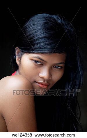 Portrait of a beautiful Cambodian woman contemplating on her life. View Large Photo Image Stock Photo - Portrait of a beautiful Cambodian woman contemplating on her life.. Fotosearch