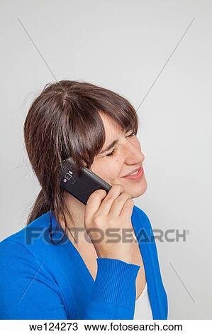 Teen girl talking on a smart phone. View Large Photo Image Stock Image - Teen girl talking on a smart phone.. Fotosearch