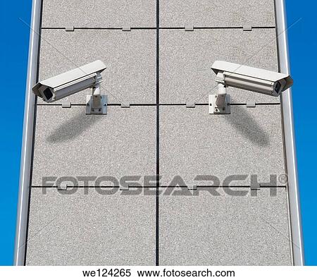 Two Security Cameras Monitoring at Different Directions. View Large Photo Image Stock Photography - Two Security Cameras Monitoring at Different Directions.. Fotosearch