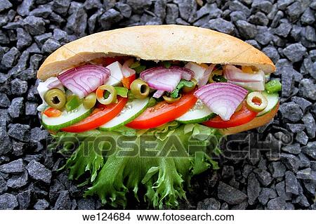 Fresh Sandwich with cucumber, onion, lettuce, tomato, olive and bread. View Large Photo Image Picture - Fresh Sandwich with cucumber, onion, lettuce, tomato, olive and bread.. Fotosearch