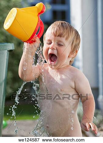 fun kid splashing water. View Large Photo Image Stock Photo - fun kid splashing water.. Fotosearch
