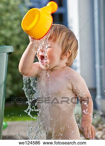 fun kid splashing water. View Large Photo Image Stock Photograph - fun kid splashing water.. Fotosearch