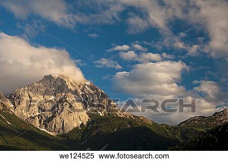 Stock Photography - Last evening light at the top of the peak Gruenstein, Mieminger mountain range, Ehrwald, Tyrol, Austria.. Fotosearch