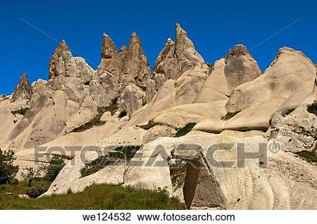 Tuff rock formations or fairy chimneys in the Love Valley Ask Vadisi near Uchisar, UNESCO World Heritage site G÷reme National Park and the Rock Sites of Cappadocia, Cappadocia, Turkey View Large Photo Image Stock Image - Tuff rock formations or fairy chimneys in the Love Valley Ask Vadisi near Uchisar, UNESCO World Heritage site G÷reme National Park and the Rock Sites of Cappadocia, Cappadocia, Turkey. Fotosearch