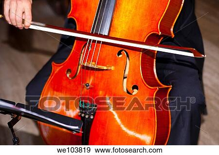 A cello being played View Large Photo Image Stock Photo - A cello being played. Fotosearch