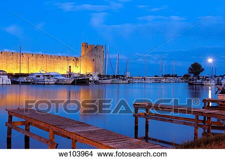 Aigues Mortes walls at Dusk Petit Camargue, Gard department, Languedoc-Roussillon Region France View Large Photo Image Picture - Aigues Mortes walls at Dusk Petit Camargue, Gard department, Languedoc-Roussillon Region France. Fotosearch