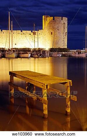 Aigues Mortes walls at Dusk Petit Camargue, Gard department, Languedoc-Roussillon Region France View Large Photo Image Stock Image - Aigues Mortes walls at Dusk Petit Camargue, Gard department, Languedoc-Roussillon Region France. Fotosearch