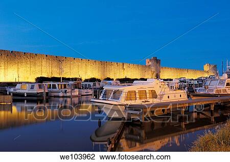 Aigues Mortes walls at Dusk Petit Camargue, Gard department, Languedoc-Roussillon Region France View Large Photo Image Stock Image - Aigues Mortes walls at Dusk Petit Camargue, Gard department, Languedoc-Roussillon Region France. Fotosearch