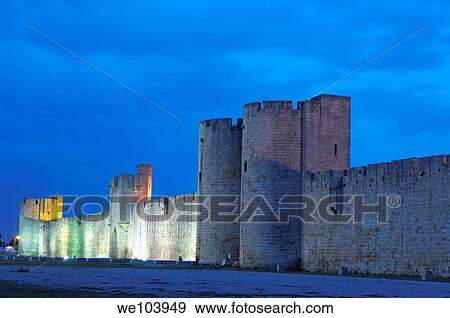Aigues Mortes walls at Dusk Petit Camargue, Gard department, Languedoc-Roussillon Region France View Large Photo Image Stock Photo - Aigues Mortes walls at Dusk Petit Camargue, Gard department, Languedoc-Roussillon Region France. Fotosearch