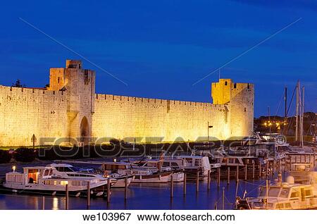Aigues Mortes walls at Dusk Petit Camargue, Gard department, Languedoc-Roussillon Region France View Large Photo Image Stock Photo - Aigues Mortes walls at Dusk Petit Camargue, Gard department, Languedoc-Roussillon Region France. Fotosearch