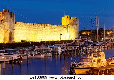 Aigues Mortes walls at Dusk Petit Camargue, Gard department, Languedoc-Roussillon Region France View Large Photo Image Stock Photo - Aigues Mortes walls at Dusk Petit Camargue, Gard department, Languedoc-Roussillon Region France. Fotosearch
