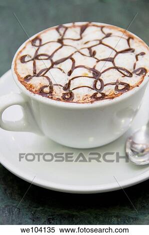 An Italian cappuccino with chocolate syrup on top View Large Photo Image Stock Photography - An Italian cappuccino with chocolate syrup on top. Fotosearch