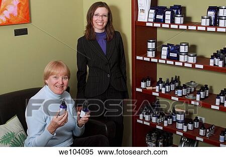 Aromatherapist and patient with natural remedies View Large Photo Image Stock Photography - Aromatherapist and patient with natural remedies. Fotosearch